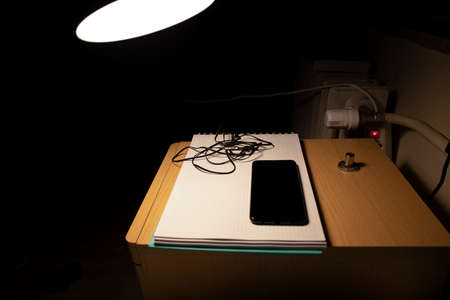 Notebook, headphone and notebook Concept on the desk.の写真素材