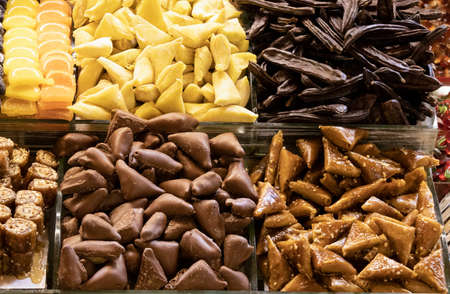 Traditional colorful Turkish desserts and candies. Taken in Spice Bazaar. Candies of different types and colors. Photographed in front of the store. Photo was taken in Turkey.の写真素材