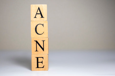 acne word in vintage wooden blocks. Close up.の写真素材