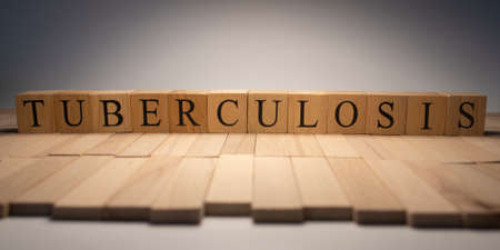 The word tuberculosis was created from wooden cubes. Health and lifeの写真素材