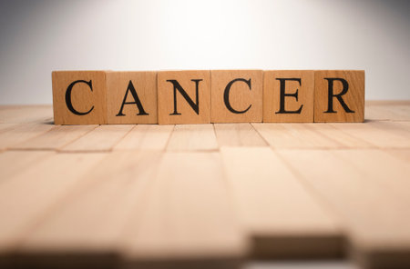 The word cancer was created from wooden cubes. Health and lifeの写真素材