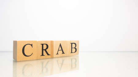 The name Crab was created from wooden letter cubes. Seafood and food. close up.の写真素材