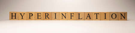 The name Households income was created from wooden letter cubes. Economics and finance. close up.の写真素材