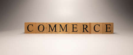 The name Commerce policy was created from wooden letter cubes. finance and economy. close up.の写真素材