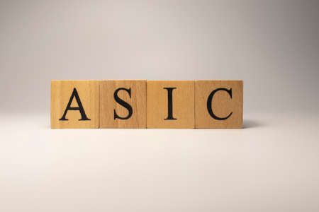 The ASIC code chain was created from wooden cubes. Industry and technology. close up.の写真素材