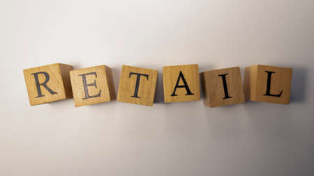 Retail word crafted from wooden cubes. close-up. shopping and economy.の写真素材