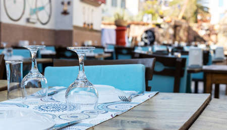 A table arranged inside the restaurant.の写真素材
