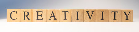 The word Creativity was created from wooden cubes. business and education concept. close upの写真素材
