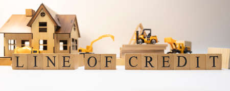 Loan of credit was created from wooden cubes. Finance and Banking. close-up.の写真素材