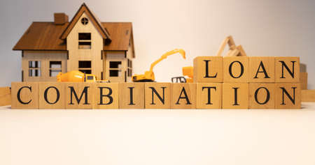 Combination loan created from wooden cubes. Finance and Banking. close-up.の写真素材