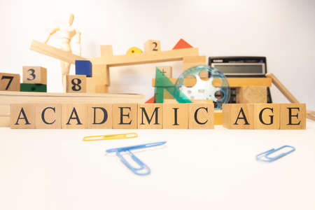 Academic age was created from wooden cubes. Education concept. Close-up.の写真素材