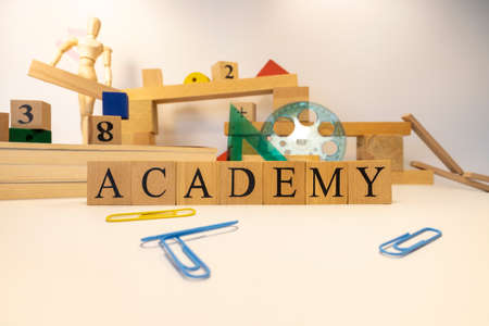 Academy was created from wooden cubes. Education concept. Close-up.の写真素材