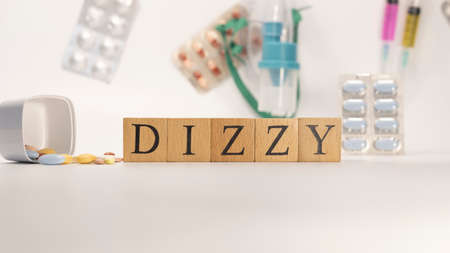 Dizzy disease was created from wooden cubes. Diseases and treatments.の写真素材