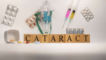 cataract was created from wooden cubes. Diseases and treatmentsの写真素材