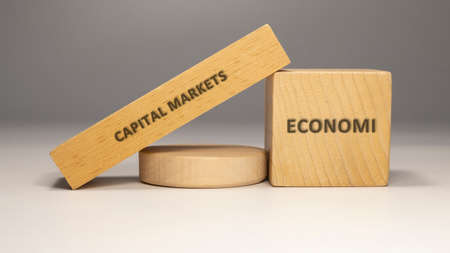 Capital markets written on wooden surface. economy and businessの写真素材