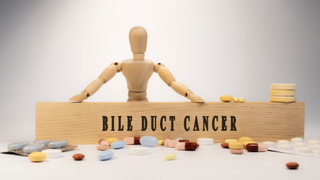 Even duct cancer was written on the wooden surface. Wooden man and medicine concept. Healthy life and diseases.の写真素材