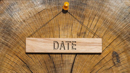 date word. Written on wooden rectangular frame surface. background log surfaceの写真素材