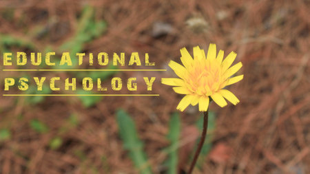Educational psychology sentence was written. Background of yellow flower.の写真素材