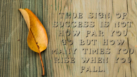 True sign of success is not how far you go but how many times you rise when you fall. success slogans.の写真素材