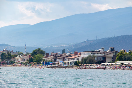 View from the Aegean sea to the shore of Turkey. Houses on the coast of the Aegean Seaの写真素材