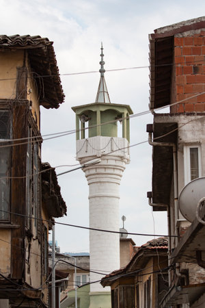 Old Mosque minaret on street view. Mosque in the old town of Balikesir, Turkey.の写真素材