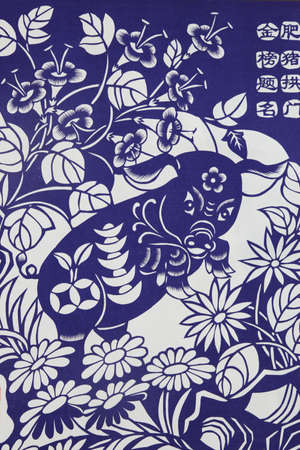 On September 11, 2016, held in xi an qujiang international exhibition center, eighth in the western cultural industry fair display of folk paper-cut: pig.のeditorial素材