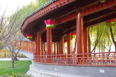 Reflection of the Tang Paradise Center at night, Xi'an, Chinaのeditorial素材