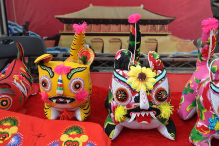 Handicraft tiger shoes. A traditional pair of shoes.の写真素材