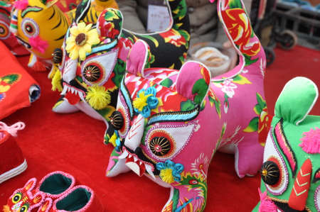 Handicraft tiger shoes. A traditional pair of shoes.の写真素材