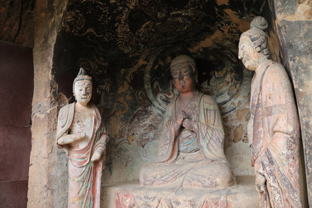 The Maijishan Grottoes Buddha statues in Tianshui City, Gansu Province are a famous tourist attraction.の写真素材