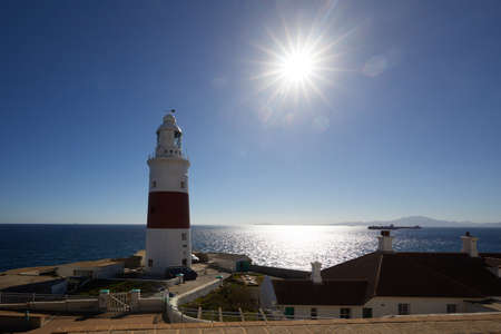 Lighthouse of Gibraltar against the sun, Gibraltar Trinity Lighthouse, opened in 1841, at the southern tip of the peninsula,の写真素材