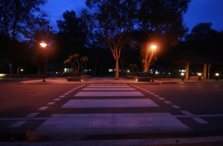 Crosswalk from road in sunset in thailandの写真素材