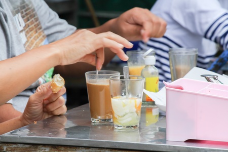 Soft-boiled egg tee and coffee for breakfast thai styleの写真素材