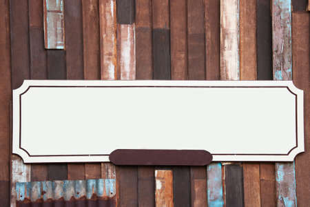 vintage signage on wooden wallの写真素材