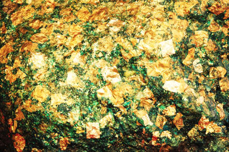 Texture gold in stone backgroundの写真素材