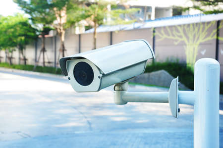 Front view of surveillance camera or cctv stand on entrance and exit for security