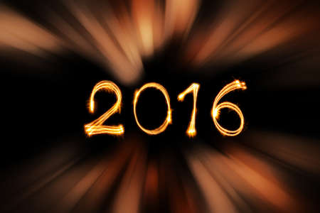 New year 2016 sparklers firework with abstract gold light zoomの写真素材