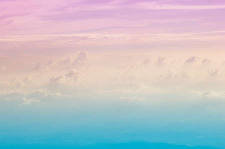Fantastic background with rose pink sky and clouds from airplane view
