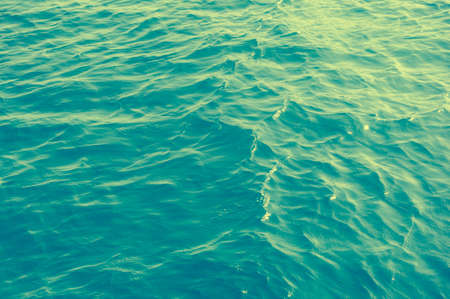 Abstract blurry sea wave ripple texture backgroundの写真素材