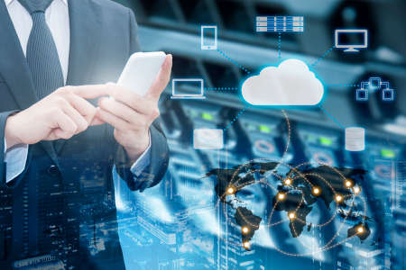 Double exposure of professional businessman connecting cloud internet smart phone with servers and cloud technology connect world network in Information Technology & Business concept, element of this image furnished by NASAの写真素材
