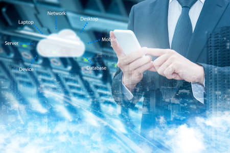 Double exposure of professional businessman connecting cloud internet smart phone with servers technology and connect world network in IT Business concept,の写真素材
