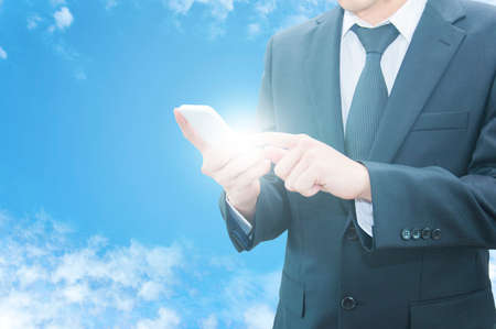 Professional businessman using cloud technology in smart phone and network connection in IT Business...