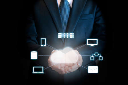 Professional businessman connecting network on hands in Cloud technology, communication and business...