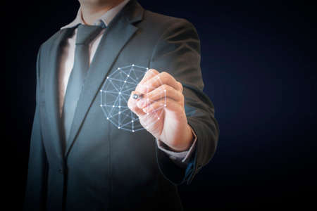 Double exposure of professional businessman touching virtual screen on a digital interface to connect world network in business and technology conceptの写真素材