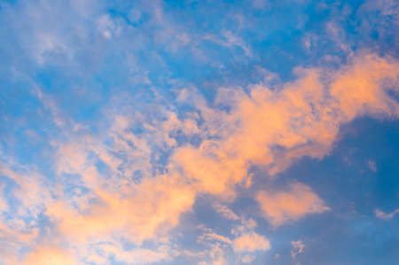 Beautiful nice blue and orange sky and could in sunset or sunriseの写真素材