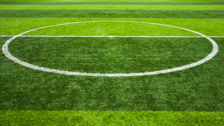 Green grass center of soccer or football field background