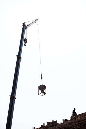 Cranes with rope hoists and lifting heavy objects 