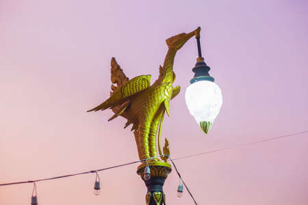 Stucco beautiful swan into a lamp pole wayside の写真素材