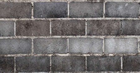Bricks were arranged alternately up vertically to form a wall の写真素材