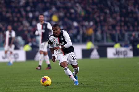 Torino, Italy. 22th January 2020. Coppa Italia. Juventus Fc vs As Roma.  Douglas Costa  of Juventus FC in actionのeditorial素材